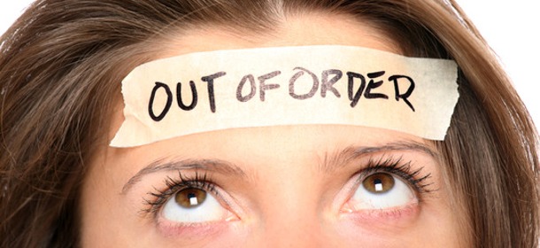 Woman-with-Out-of-Order-Sign-on-Head